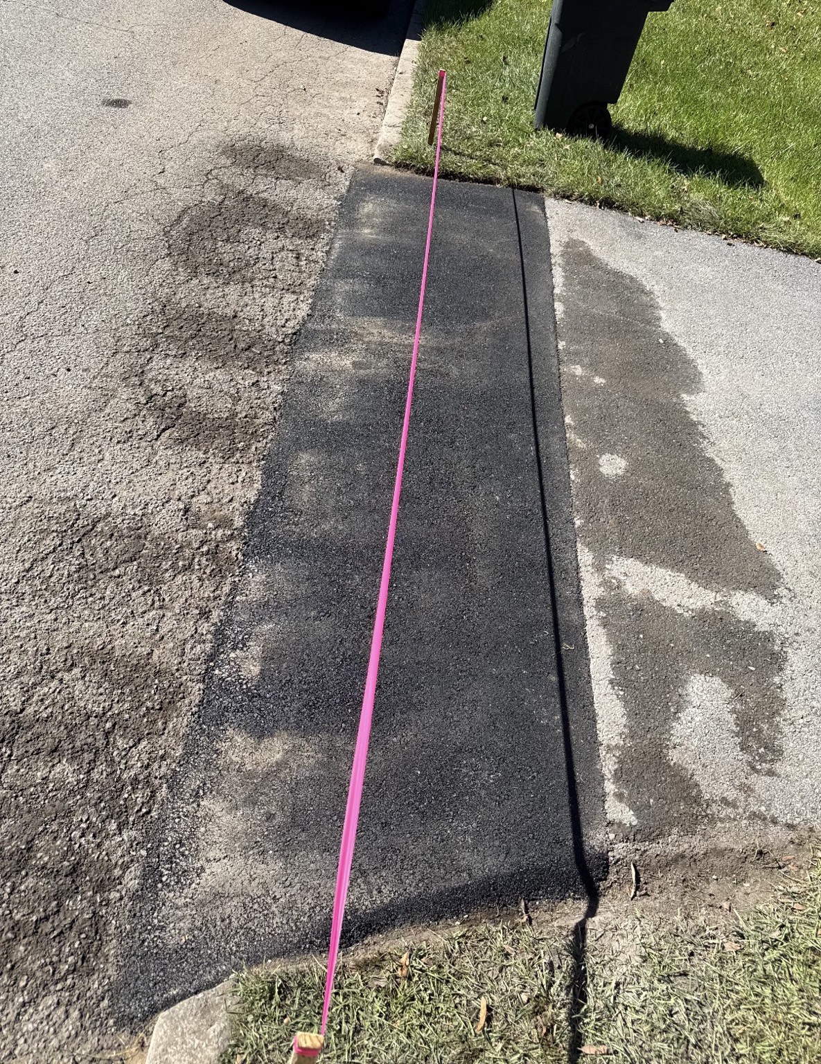 Fresh asphalt patch work by Elevated Asphalt