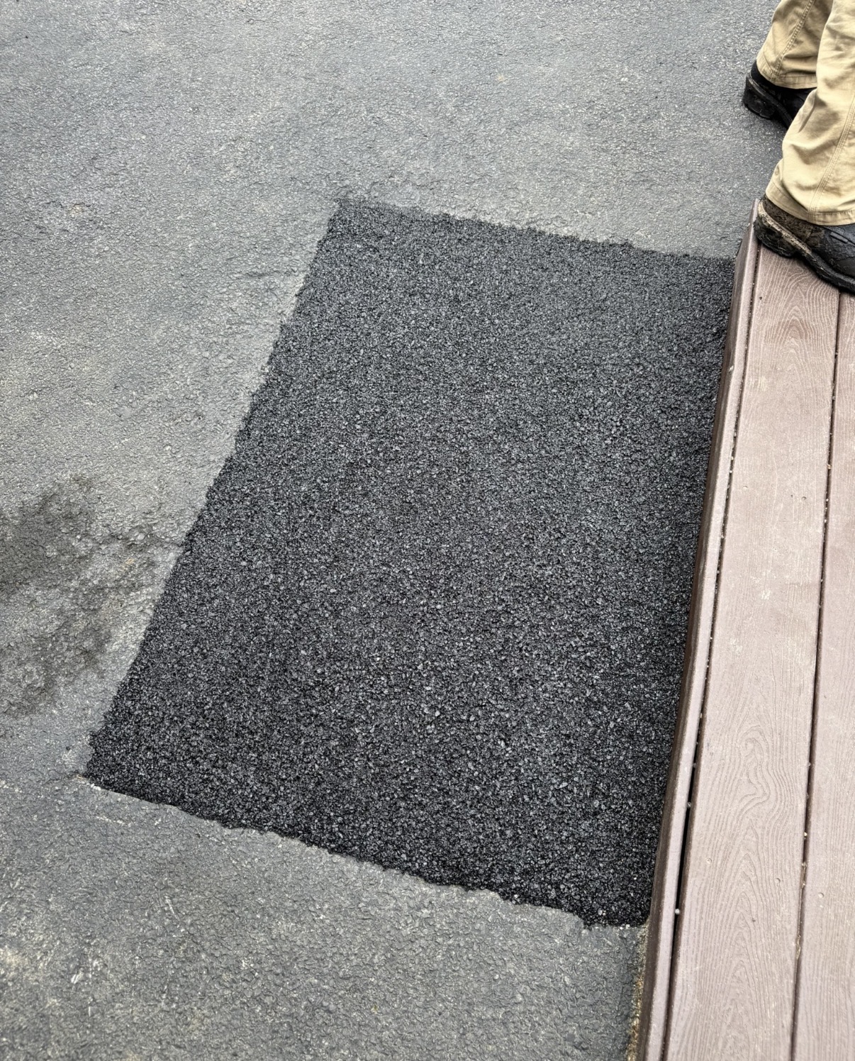 Fresh asphalt patch work by Elevated Asphalt