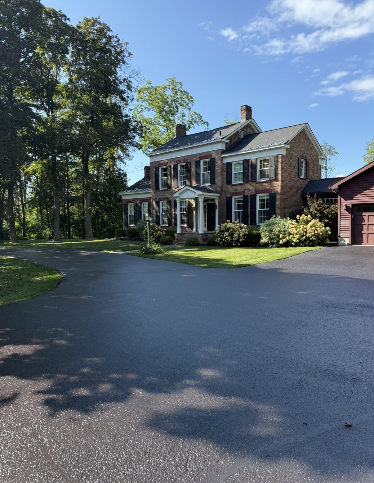 Finished driveway project by Elevated Asphalt