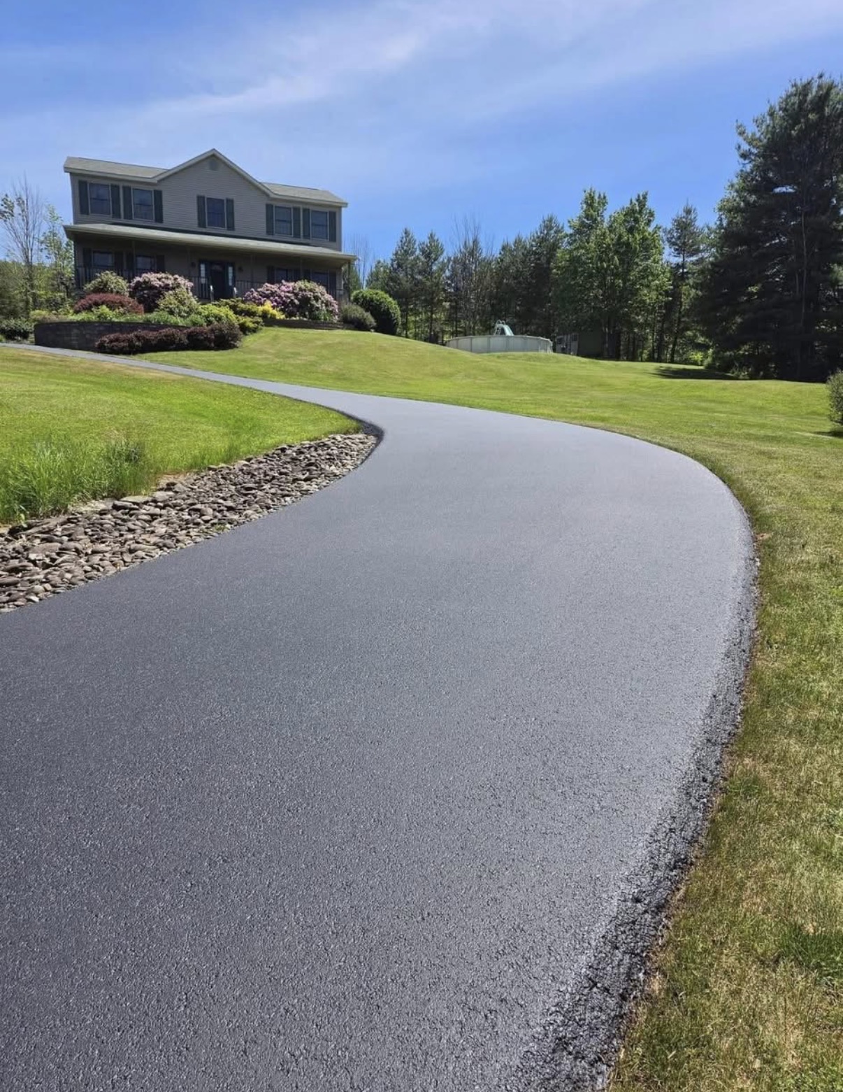 Finished driveway project by Elevated Asphalt