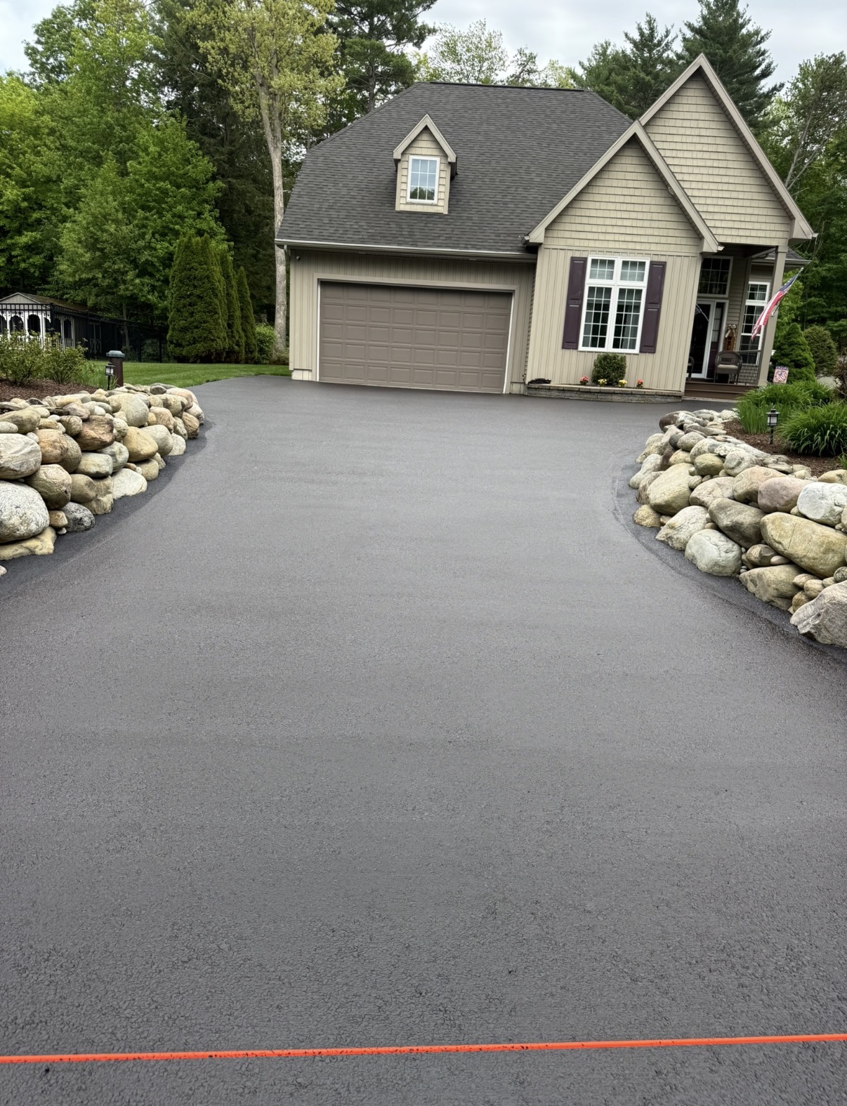 Finished driveway project by Elevated Asphalt